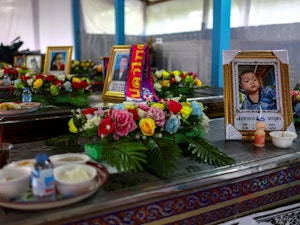 Thailand massacre triggers king's appearance as opposition pounces
